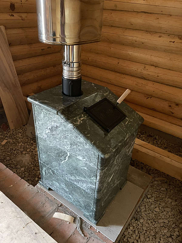 Монтаж банная печи НМК Сибирь 25 с закрытой каменкой в облицовке "Президент"